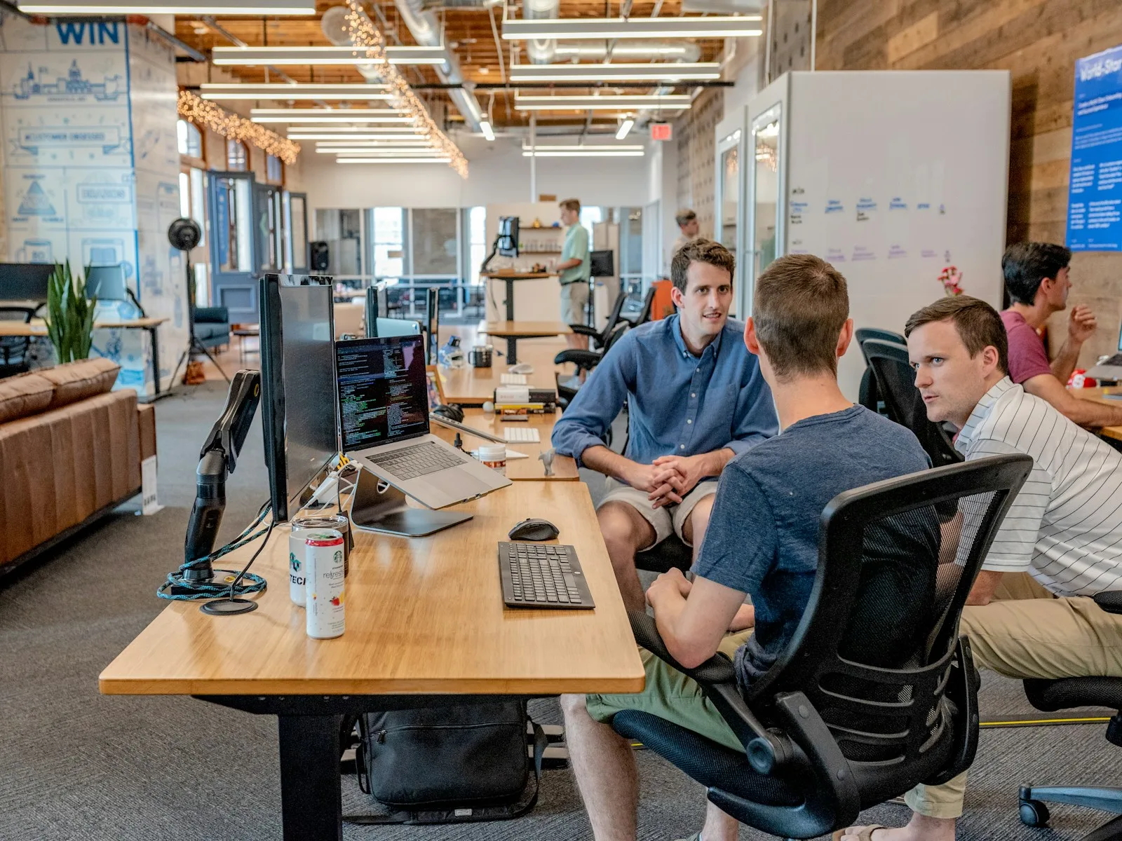 Colleagues reviewing work together at a table